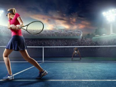Female Tennis Player in Action
