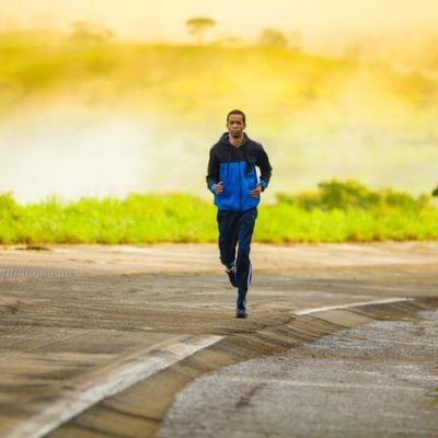 Man Running in Tracksuit