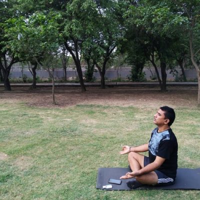 Man doing Yoga Outdoor