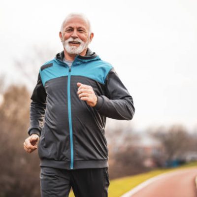 Older Man Running in Tracksuit